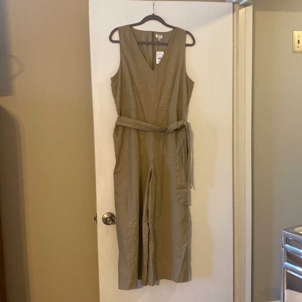 Brand new, tan, sleeveless jumpsuit.